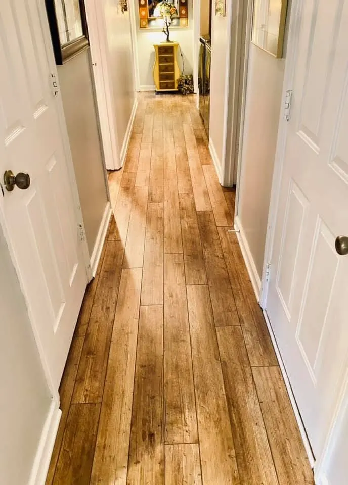 Warm wood-plank hallway installation